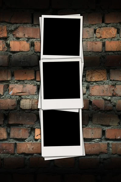 Three Blank Photos on Brick Background — Stock Photo, Image
