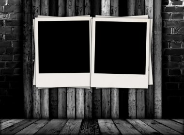 Two Blank Photos In Dark Room clipart