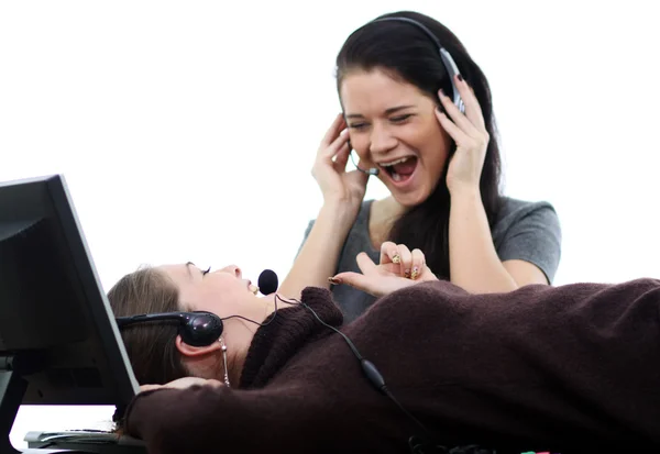 Mulheres de negócios com fone de ouvido — Fotografia de Stock
