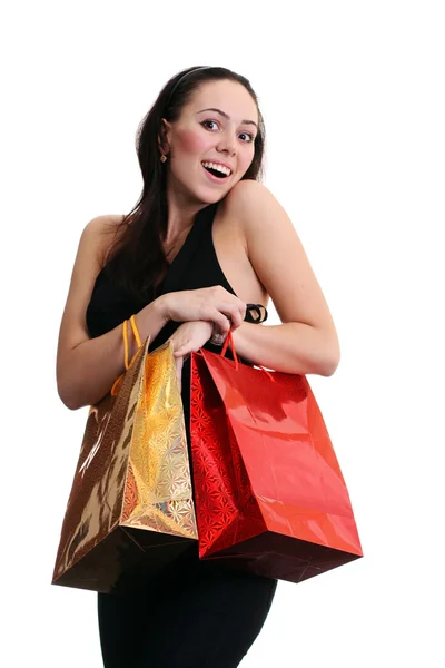 Ευτυχισμένη κοπέλα ενηλίκων με ανοιχτόχρωμα σακούλες — Φωτογραφία Αρχείου
