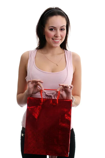 Happy young adult girl with colored bags — Stock Photo, Image