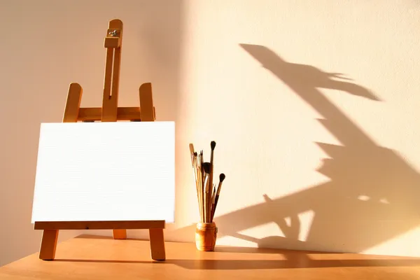 Easel with canvas — Stock Photo, Image