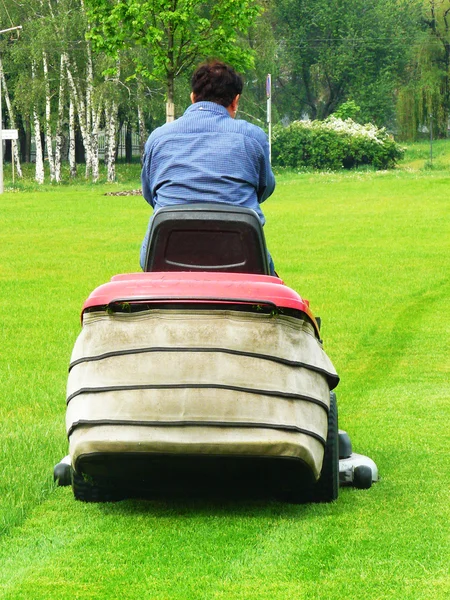 stock image Person shears a lawn-mower lawns