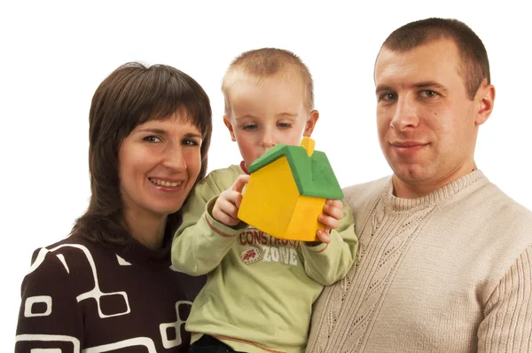 Ευτυχισμένη οικογένεια σε αναζήτηση καταλύματος — Stock fotografie