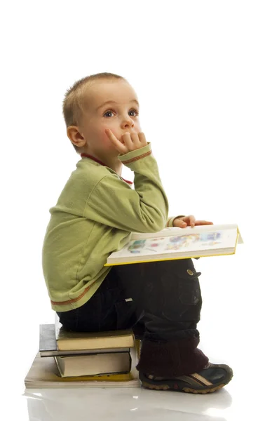 Niño con pila de libro —  Fotos de Stock