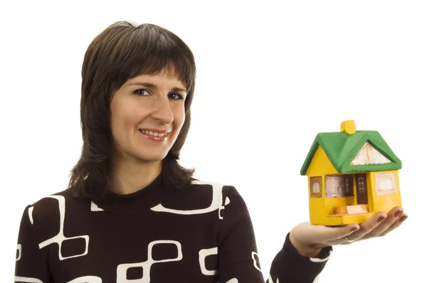 Μοντέλο μικρό σπίτι σε ένα γυναικείο χέρι — Φωτογραφία Αρχείου