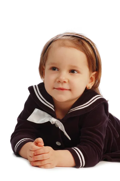 Malá holčička na bílém pozadí — Stock fotografie