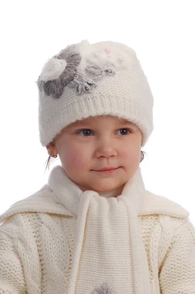 Malá holčička na bílém pozadí — Stock fotografie