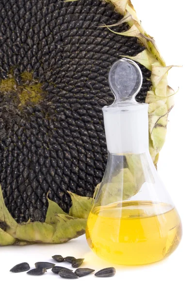 Biji bunga matahari dan minyak terisolasi — Stok Foto