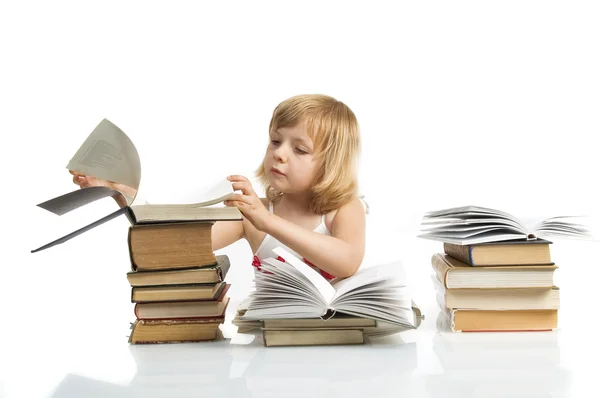 Meisje met stapel boeken — Stockfoto
