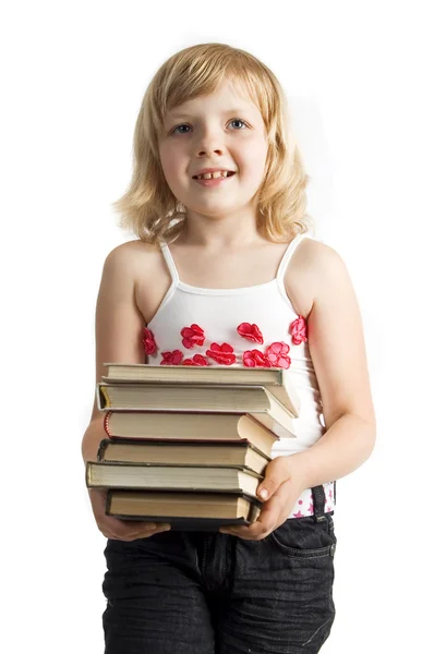 Lány a verem a könyvek — Stock Fotó
