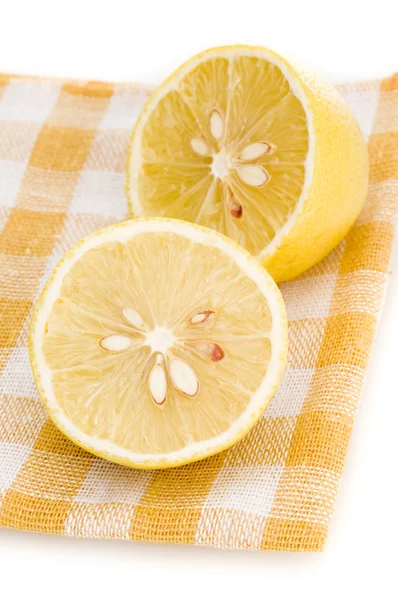 Лимон на плацемат изолирован — стоковое фото