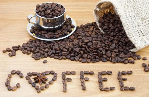 Kahve çekirdekleri ve kahve çekirdekleri kap — Stok fotoğraf