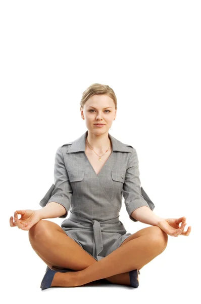Woman sitting in lotus position — Stock Photo, Image
