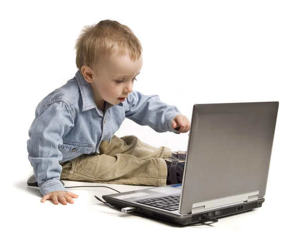 Boy with laptop Stock Picture