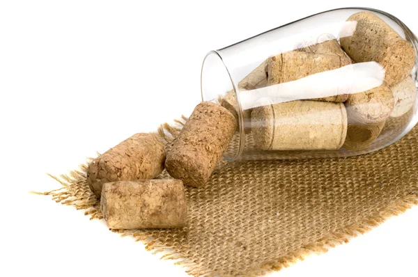 Wineglass and corks — Stock Photo, Image