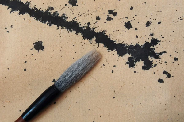 Pattern of old paper and brush — Stock Photo, Image