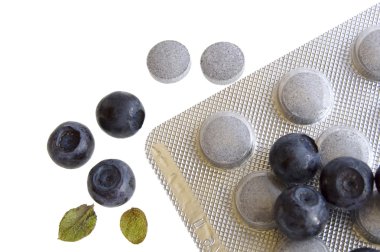 Blueberries and vitamin supplement: eye protection clipart