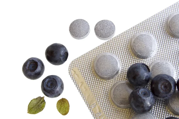 Blueberries and vitamin supplement: eye protection — Stock Photo, Image