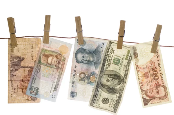 Money laundering on clothesline isolated on white background — Stock Photo, Image