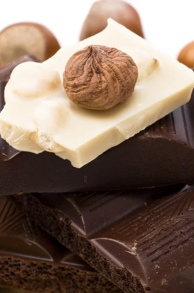 Brick of chocolate with nuts — Stock Photo, Image