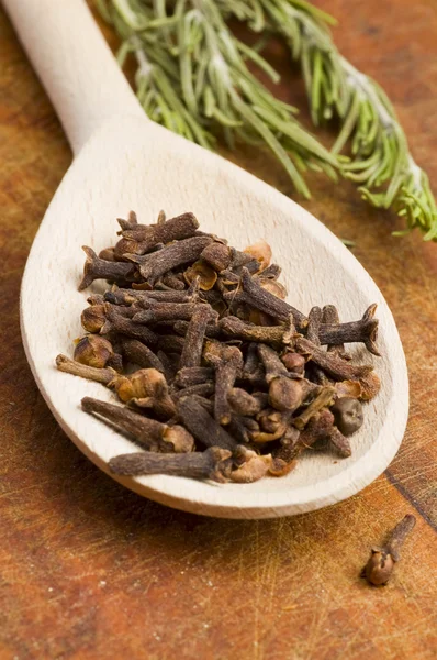 Cloves spice in spoon — Stock Photo, Image