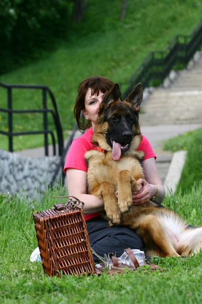 Young woman and dog — Stock Photo, Image