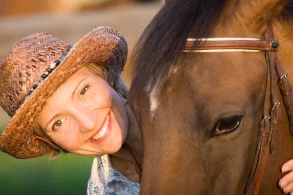 Woman embrace brown horse — Stock Photo, Image