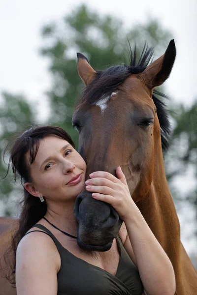 Pregnant woman with horse — Stock Photo, Image