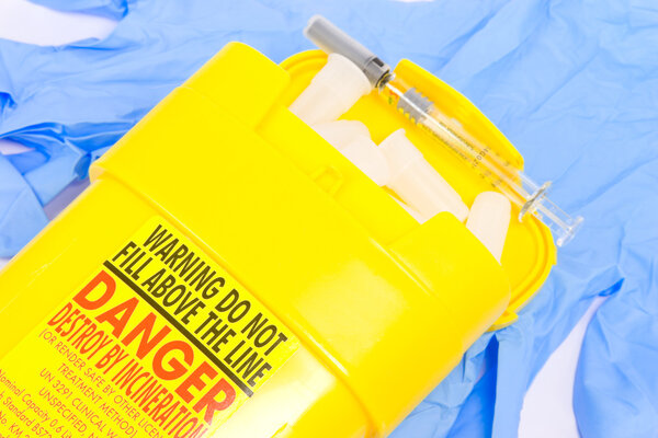 Container for used medical syringes