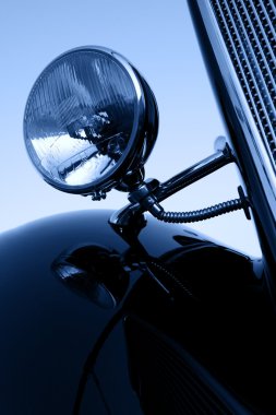 Vintage car chromium-plated headlights , shallow DOF clipart