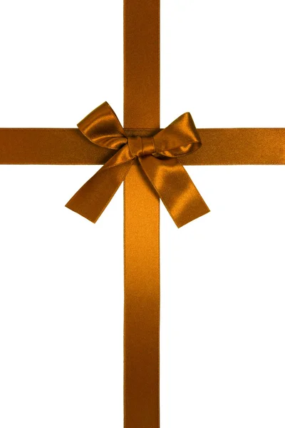 Golden-brown vertical cross ribbon with bow — Stock Photo, Image