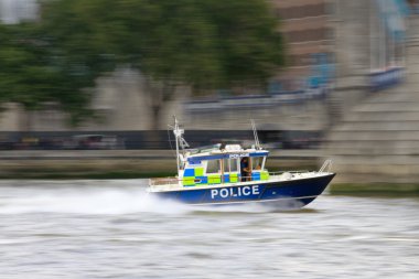 Police motorboat in motion clipart