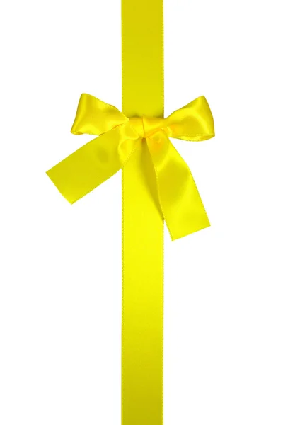 Ruban vertical jaune avec nœud, isolé — Photo
