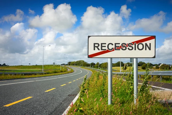 Road with recession sign crossed with red line — Stock Photo, Image