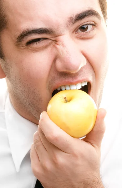 Empresário comer maçã — Fotografia de Stock
