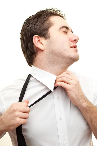 Tired businessman undressing — Stock Photo, Image