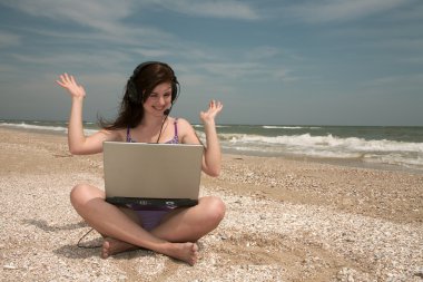 Beach, girl & laptop clipart