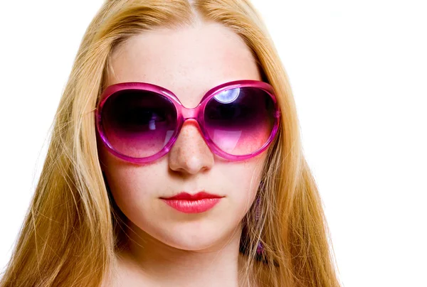 Adolescente chica usando gafas de color rosa —  Fotos de Stock