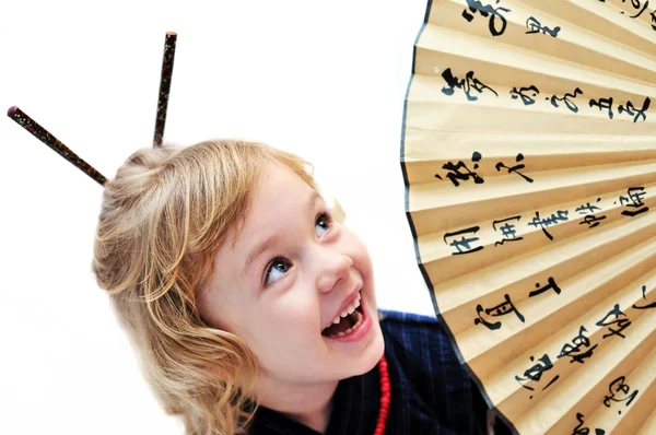 Little girl with fan — Stock Photo, Image