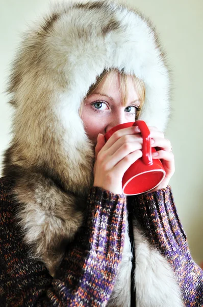 Drinking winter girl — Stock Photo, Image