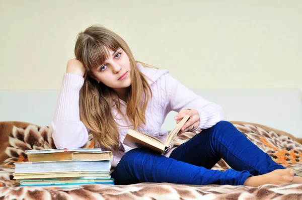 Bored girl with books — Stock Photo, Image
