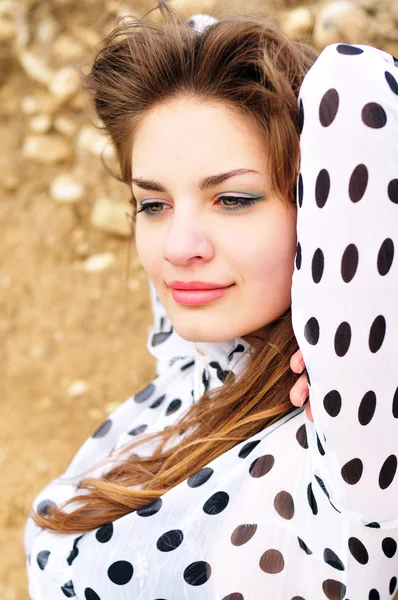 Young girl wearing spotted blouse — Stock Photo, Image