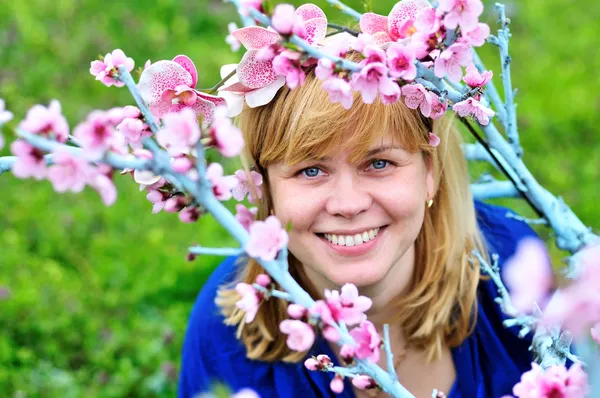Woman in spring garden — Stock Photo, Image