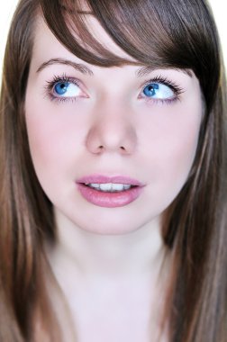 Blue-eyed girl looking up clipart