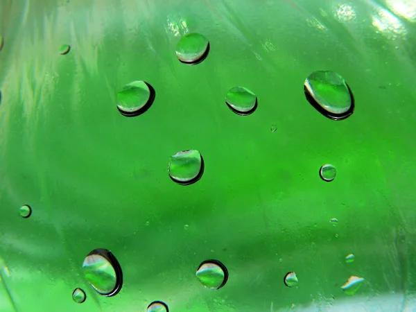 Green glass with drops 2 — Stock Photo, Image