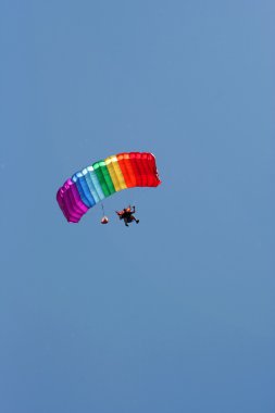 Parachuter with colored parachute clipart