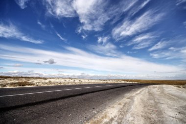 Road on cretaceous mountains clipart