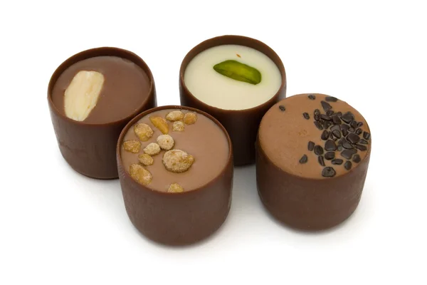 Vier Schokoladenbonbons — Stockfoto