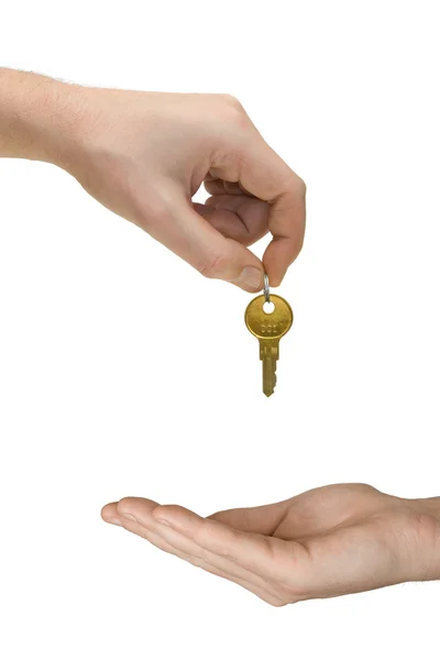 Hands and golden key — Stock Photo, Image